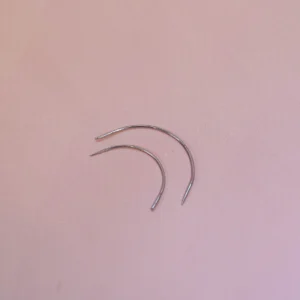 2 curved needles